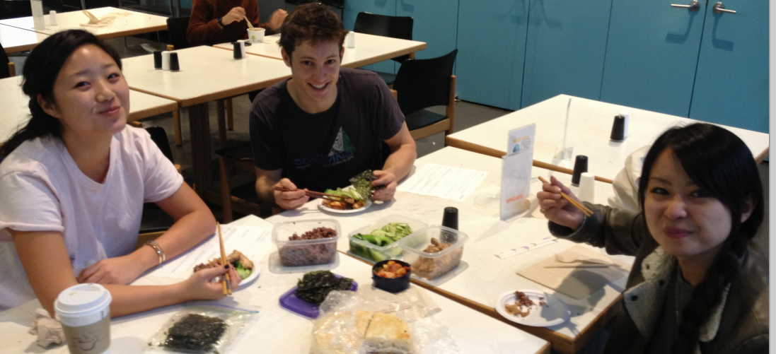 TJ's lunch bunch (Jocelyn & Natsuki) sharing rice, cucumber, chicken, kimchi, and nori.