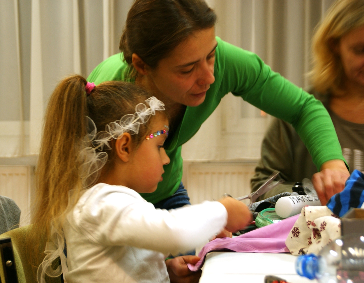 woman and girl doing crafts