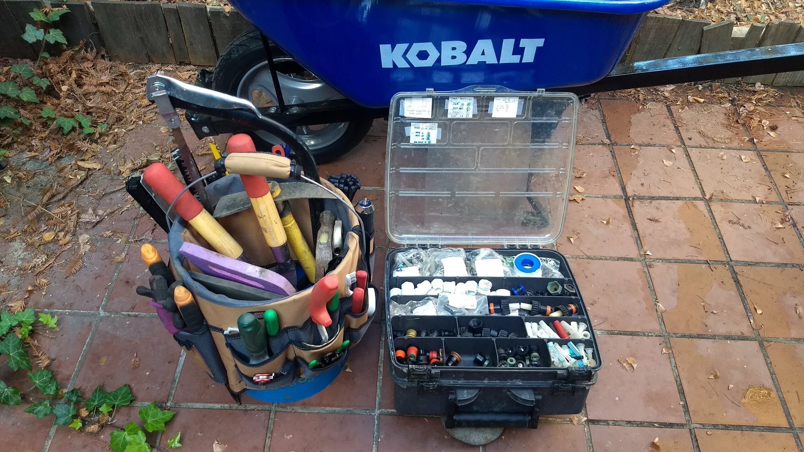 A selection of tools and parts I’ve acquired to maintain our neighborhood irrigation system. Credit: Neal Gorenflo. 