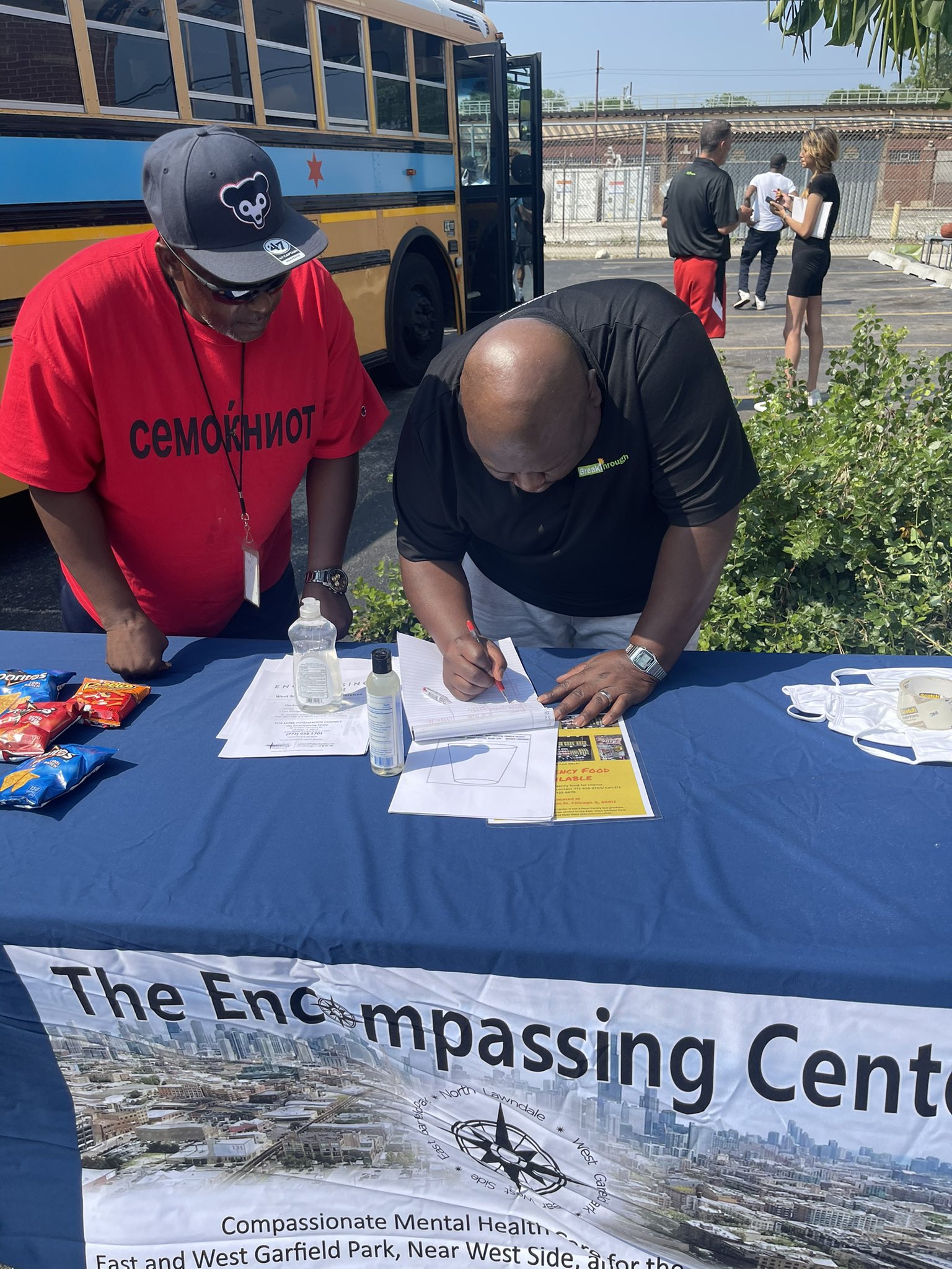 mental health: Over the summer, the Center partnered with Breakthrough Urban Ministries, hosting a table at their East Park Takeover resource fair. Credit: The Encompassing Center