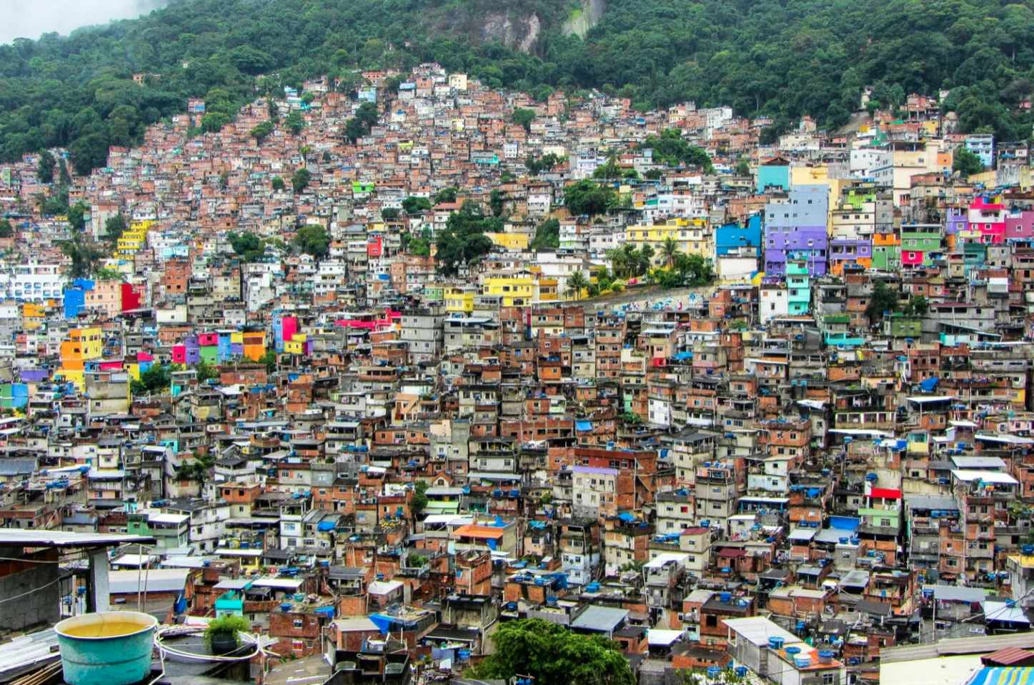 Activist groups across the globe are beginning to advocate for alternative land governance models (like community land trusts) for informal settlements. The Rio-based <a href="https://catcomm.org">Catalytic Communities</a> are proponents of similar actions in Brazil's favela communities. Credit: Journey Wonders