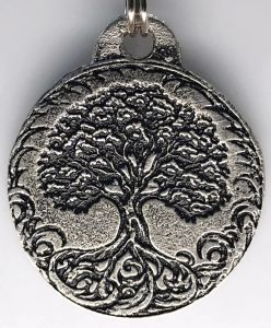 Handmade pewter sacred-tree pendant created by Miya Kressin’s Pixie Wolf.